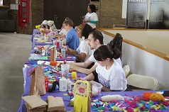 Families creating art at Family Arts Day 2014