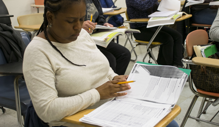 Student looking at notes