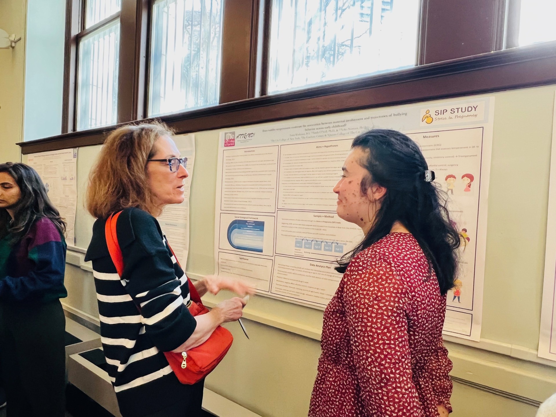 PhD students presenting posters at Research Day in the fall 
