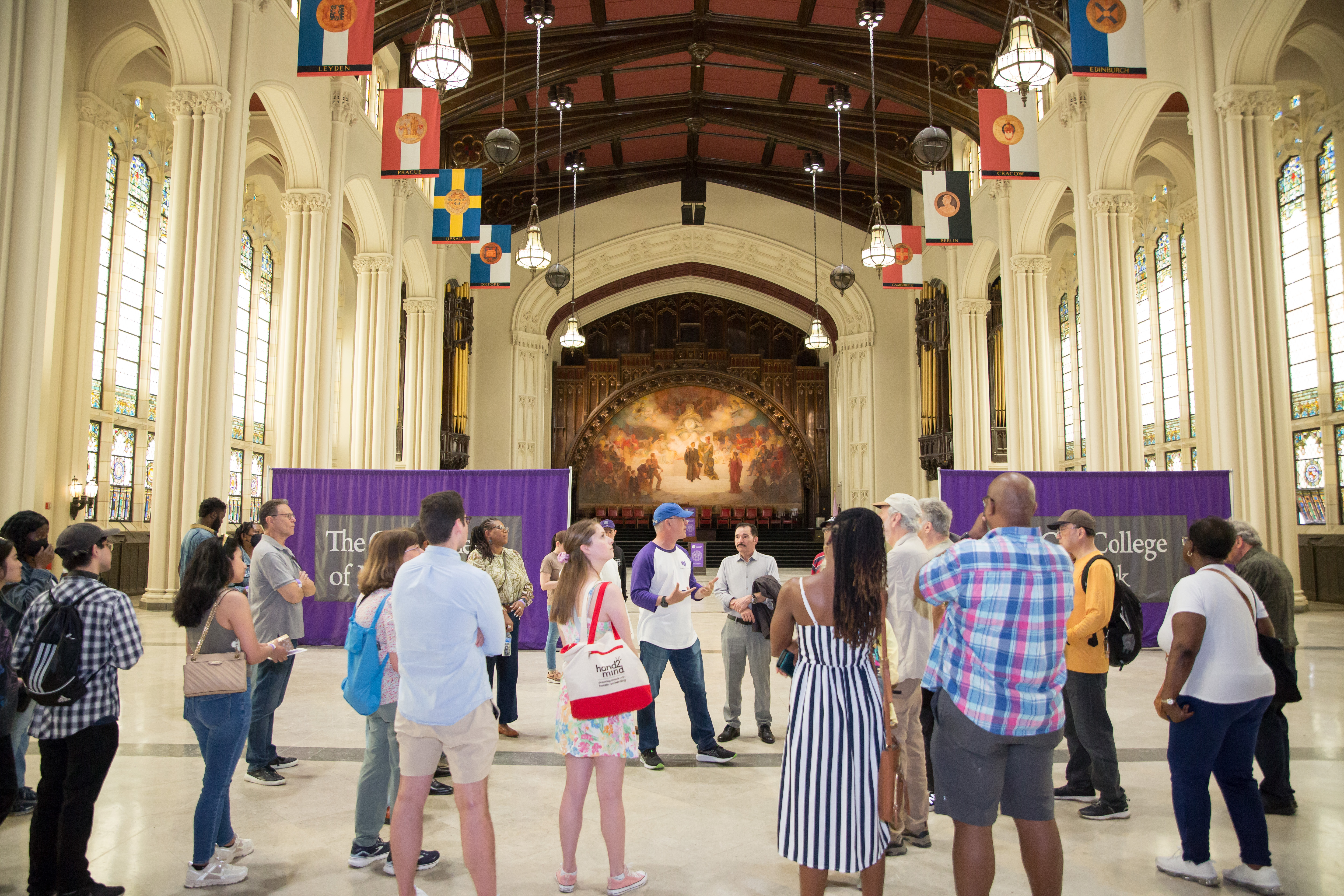 CCNY President Boudreau and alumni touring the Great Hall during Homecoming Day