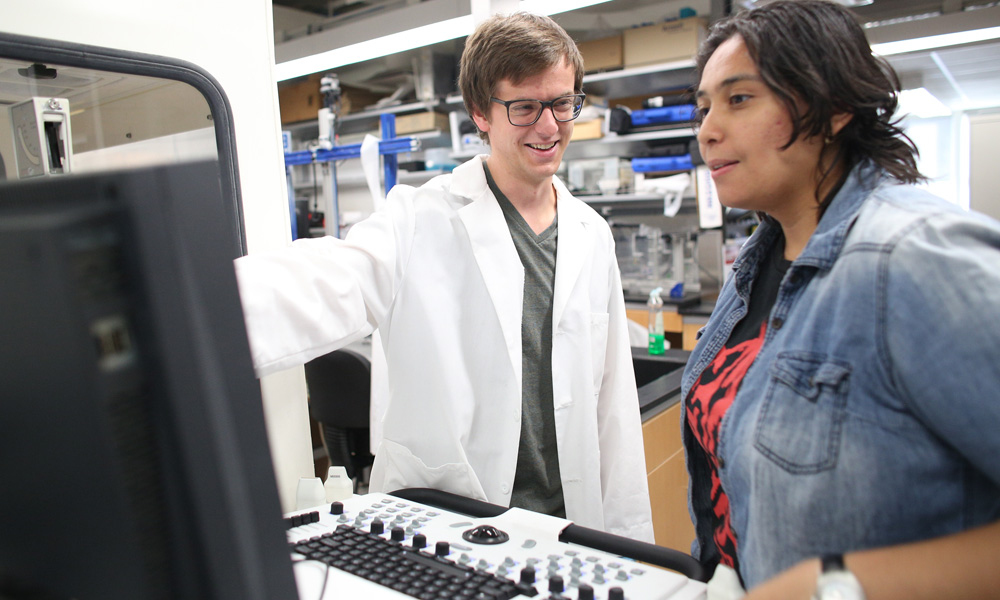 Faculty and student in lab