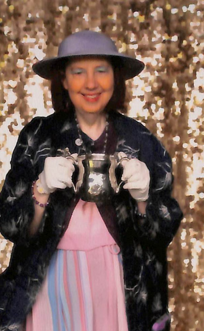 CCNY archivist Sydney Van Nort (Class of 2004 M.A.) with the Loving Cup.