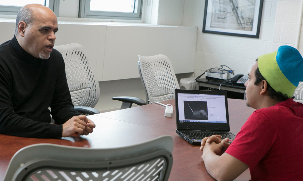 Mentor talking to student