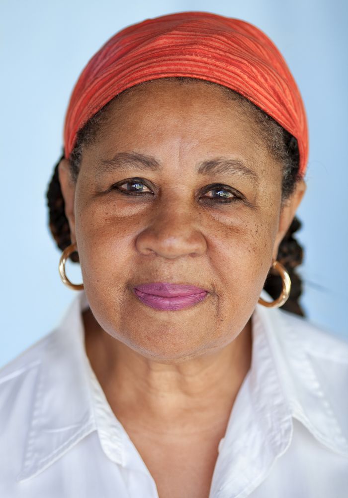 Photograph of Jamaica Kincaid with blue background.
