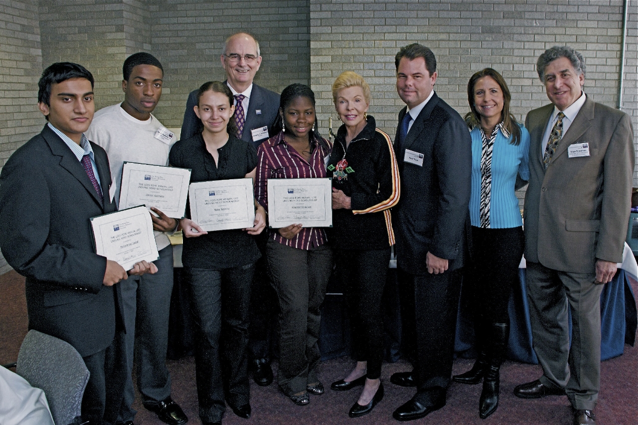 From left: Mohammad Sadat, Daniel Asemota, Maha Salama, Dr. Gregory H. Williams, Chantal Strachan, Mrs. Lois Pope, her son Paul Pope, her daughter Maria Kessel and Sophie Davis School Dean Eitan Friedman.