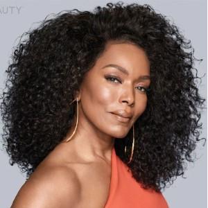 Angela Basset is looking into the camera from the side