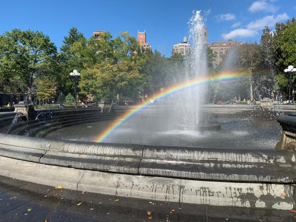 Rainbow over the fountain in Washington Square Park 