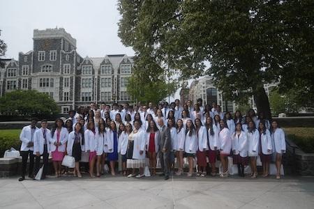 CUNY Med Dean Carmen Renée Green and Chancellor Félix V. Matos Rodríguez with graduating class.