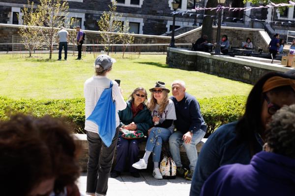People on a tour taking a photo