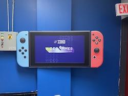 Nintendo Switch screen with title of exhibit, Video Games: The Great Connector.