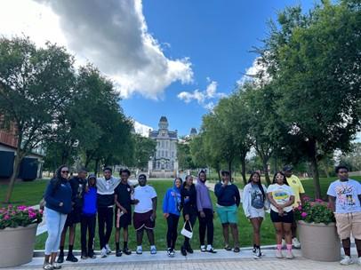 Students infront of monument