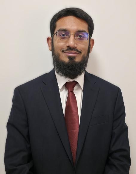 Portrait photograph of Abdullah Hossain