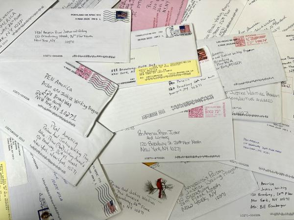 Photo of mail scattered across Sophie Torres' desk