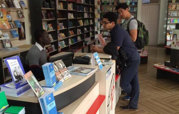 Da Wi Shin and Bishoy Ghobryal interviewing a potential customer in Kenya.