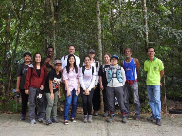 Photo of David Lohman and students in Thailand