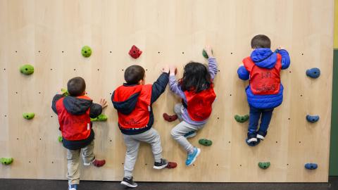Toddler rock climbing activity an example of what is available at CCNY Child Development Center