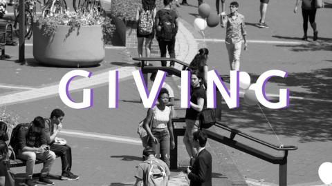 black and white image in NAC plaza with students