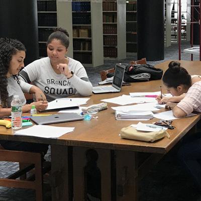 Two students in the library 