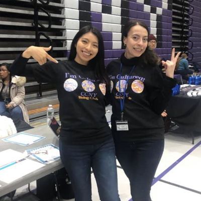 Two students standing next to each other