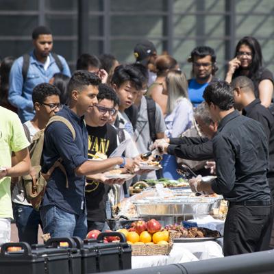 Students on campus for event with food