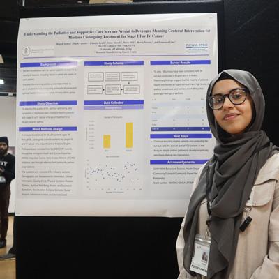 Student in front of poster presentation 
