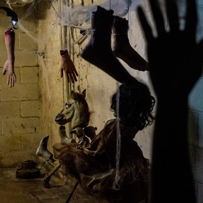 scare hallway with hanging hand