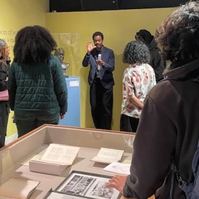 Multi cultural students taking in a Schomburg Museum Tour