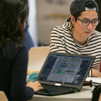 Student looking at a computer