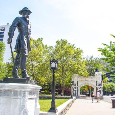 Photo of campus with statue of General Webb