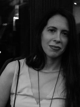 A black and white photo of Rosenblatt in front of the Bowery Poetry Club. Photo by Thomas Sayers Ellis