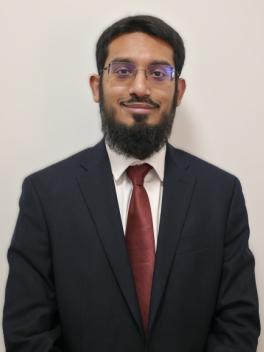 Portrait photograph of Abdullah Hossain