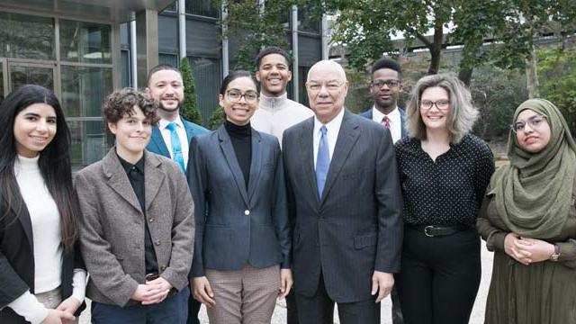 A cohort of Colin Powell School students with Gen. Colin L. Powell (1937-2021) during one of his visits to his alma mater.